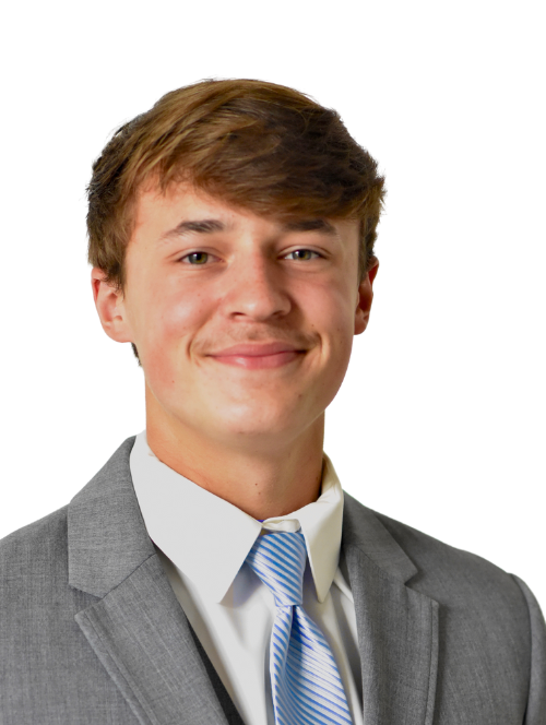 Landon Bruski, founder of Bruski Branding Services, captured in a professional headshot for branding and marketing expertise.